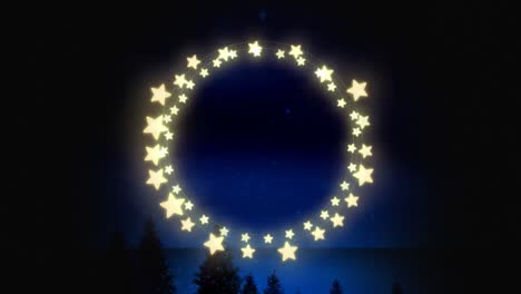 animation of fairy light frame with copy space over fir trees and winter scenery