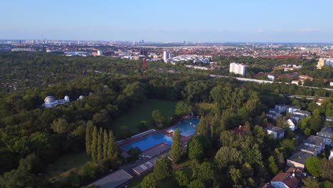 lovely aerial top view flight berlin city public swimming pool germany in europe, summer day 2023