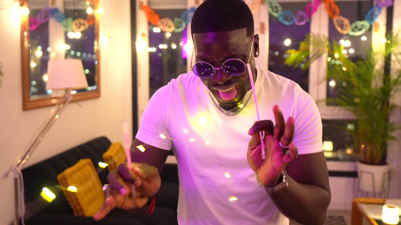 Man Celebrating Indoors with Decorations