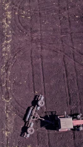 tractor in the dust working in the field