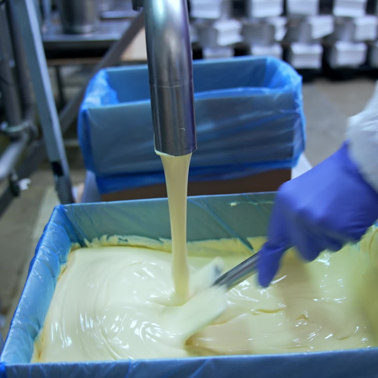Producing butter food industry. Industrial making cheese in big factory