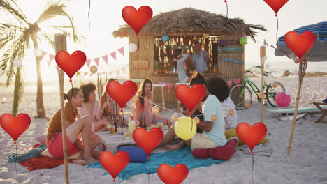 animación de globos de amor de corazón rojo iconos digitales sobre amigos haciendo fiesta en la playa