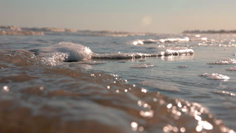 sea waves rushing at the beach