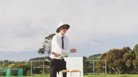 Cricket-umpire-making-signs-standing-on-a-cricket-pitch