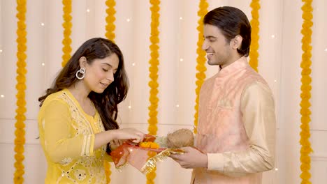 Indian-girl-preparing-Pooja-thali