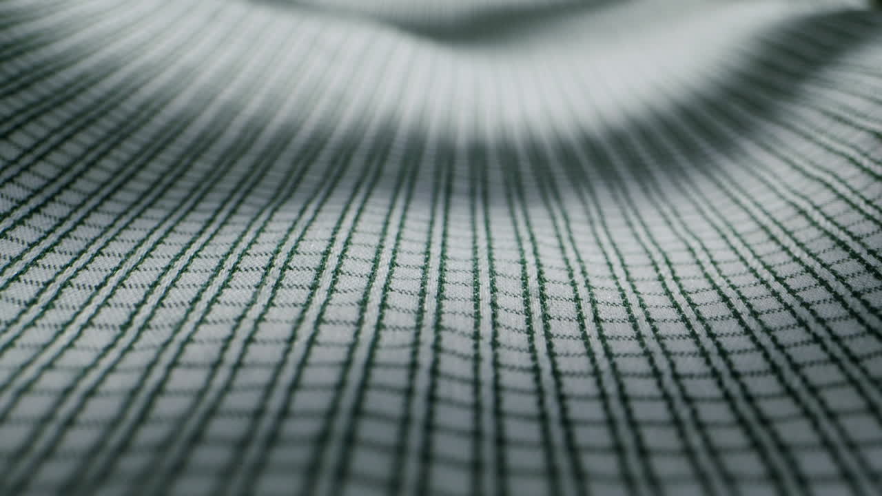 Closeup of an expertly tailored suit that beautifully showcases its sophisticated buttons and fine fabric texture