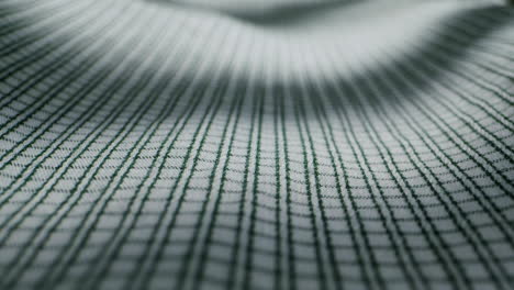 closeup of an expertly tailored suit that beautifully showcases its sophisticated buttons and fine fabric texture