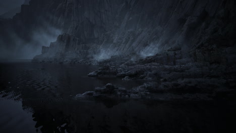 dramatic coastal landscape revealing hidden rocks and mist at dusk