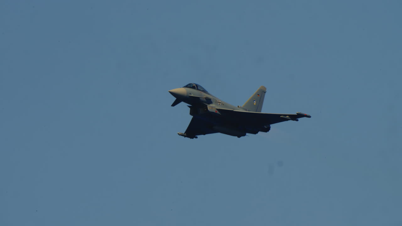Eurofighter Typhoon Fighter Jet Flying in Clear Blue Sky