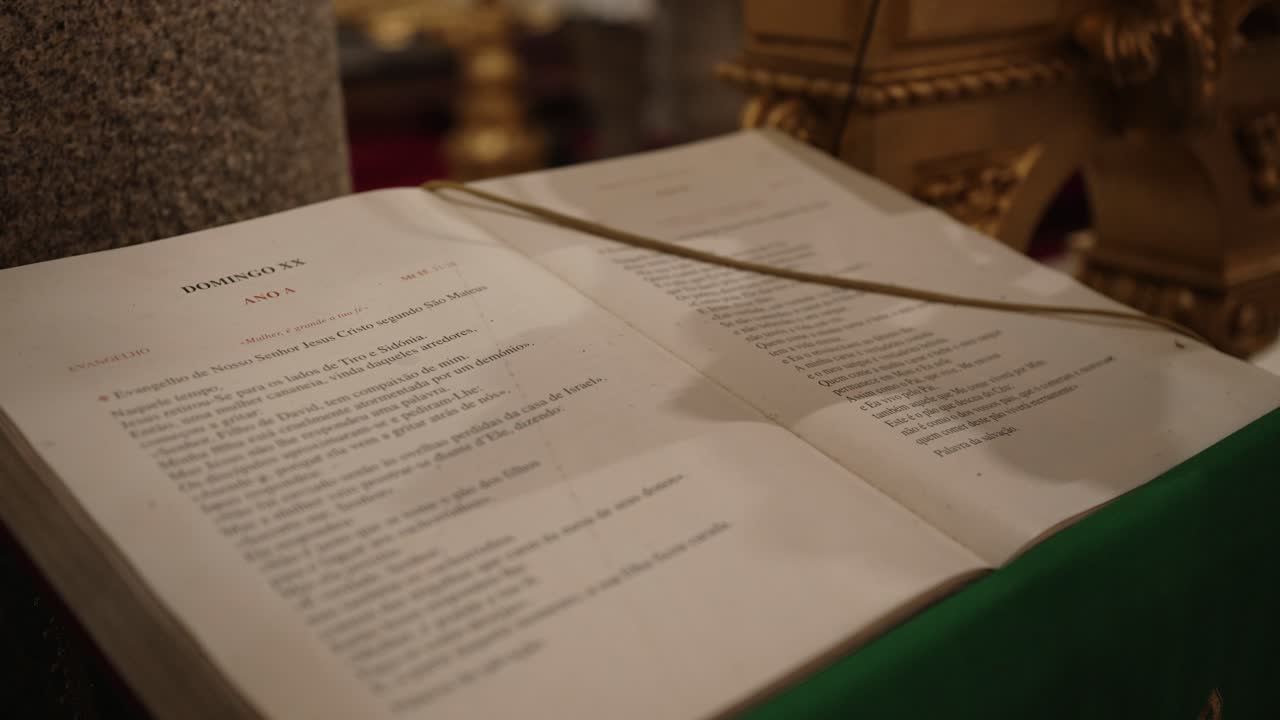 Close up of a liturgical book open on a church lectern during a religious service