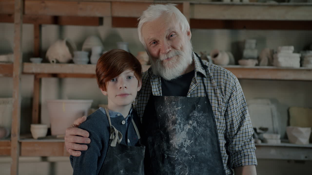 Grandfather and Grandson in Pottery Studio