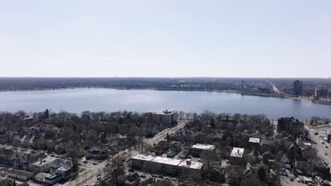 push in drone aerial shot of a lake in the spring time in minnesota