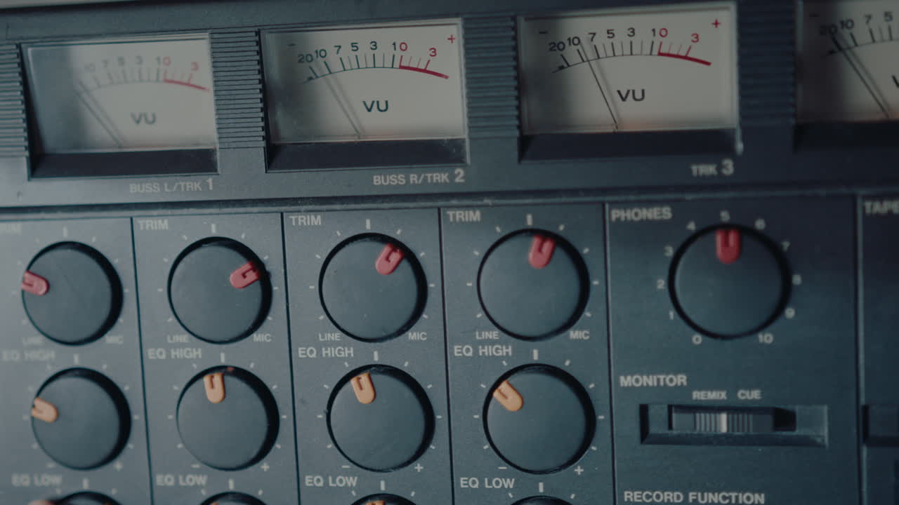 Male Hand Using Vintage Multitrack Cassette Recorder for Making Music