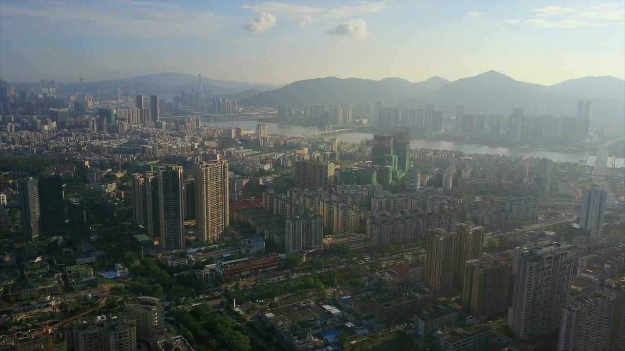 puesta de sol luz de día hora de la ciudad de zhuhai panorama aéreo 4k china