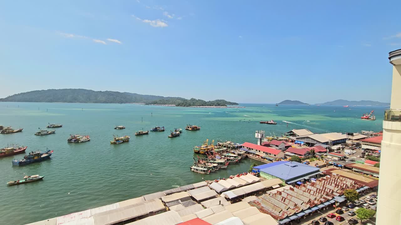 Scenic Sea Views From Waterfront Hotel In Sinsuran, Kota Kinabalu, Malaysia. high angle, static shot