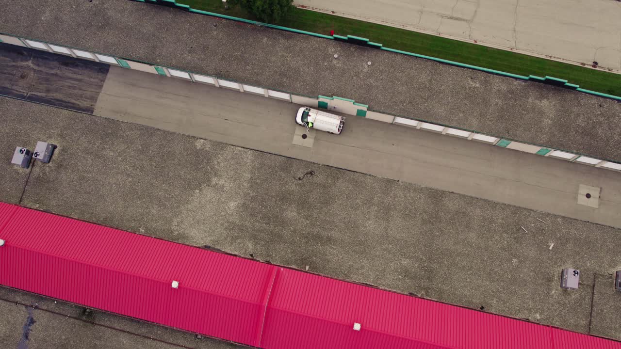Male entering a white van
