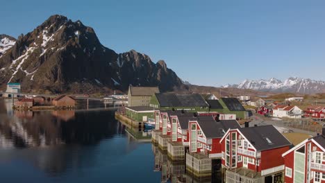 aerial drone shot paning from red hoses to a big mountain in the background