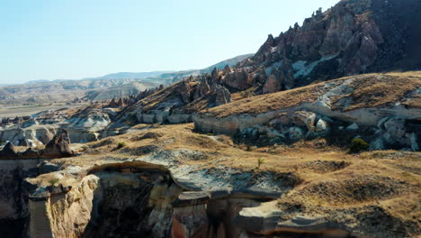 flying over unique cappadocia landscape in goreme, turkey