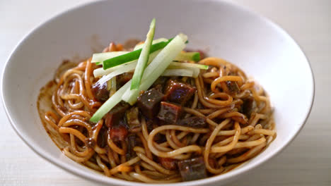 jajangmyeon or jjajangmyeon is korean noodle with black sauce - korean food style