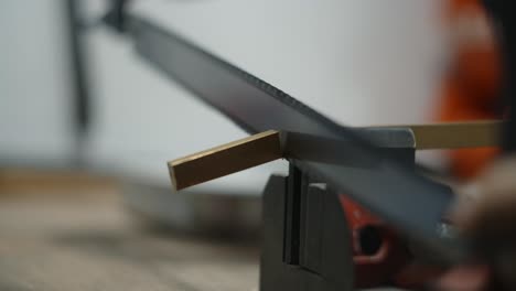 cutting wood with a hand saw