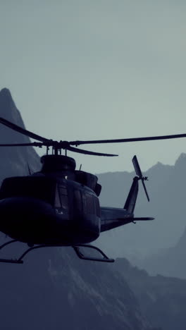 helicopter flying over mountains