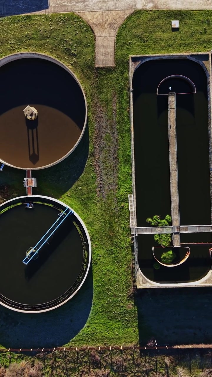 The treatment facility works on cleaning water in large tanks