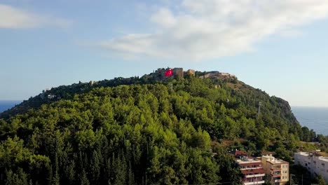 turkish castle on a hilltop with aerial view