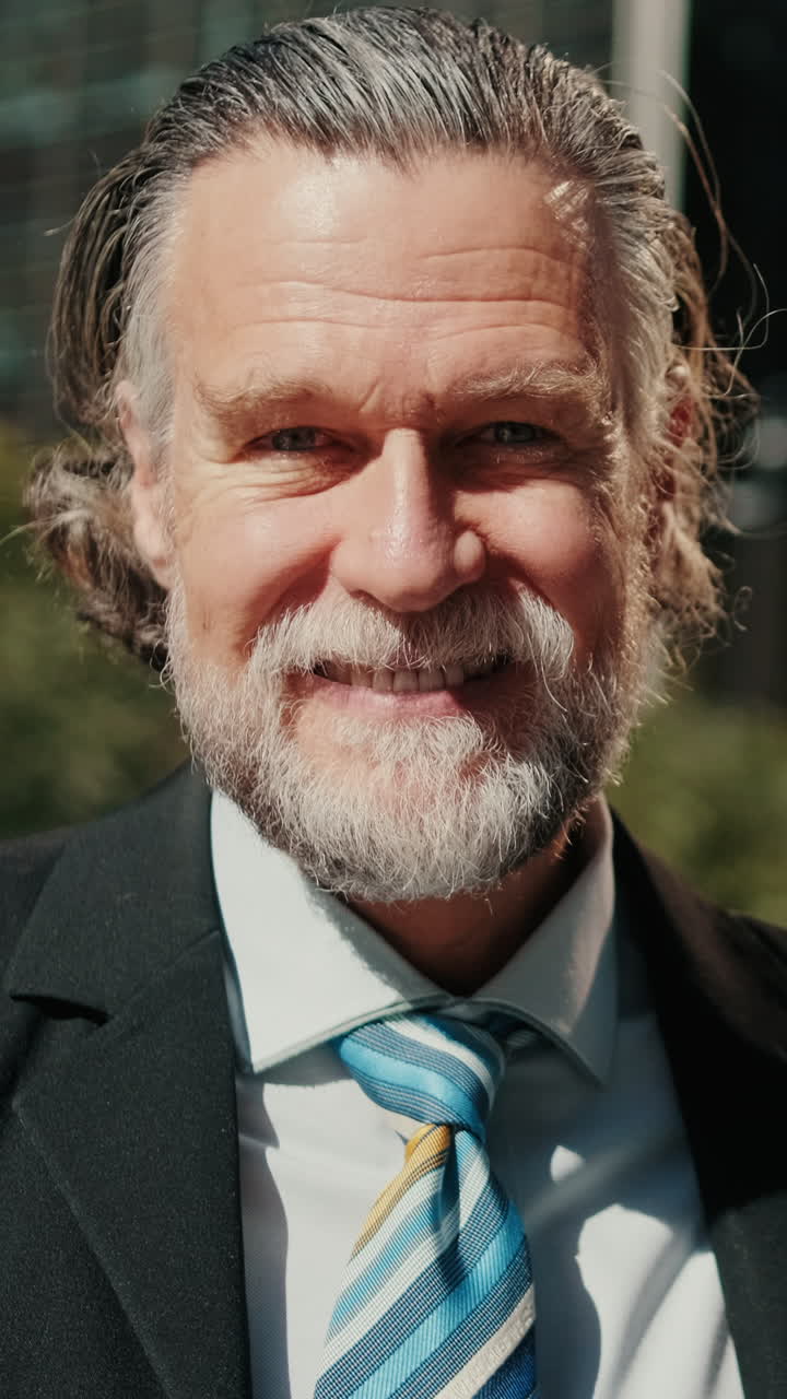 Confident Senior Businessman Enjoys Coffee Break