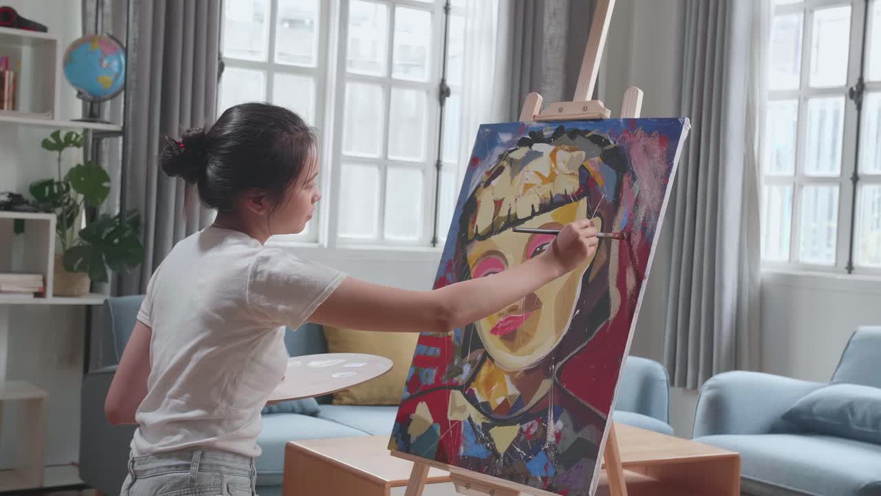 Woman Painting a Portrait at Home
