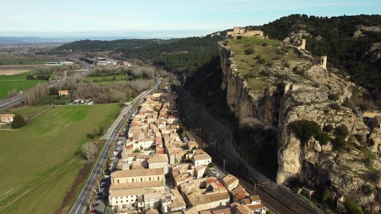 Aerial View of Village by Cliffside Fortress