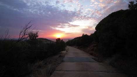 timelapse of a sun rise on a small hill