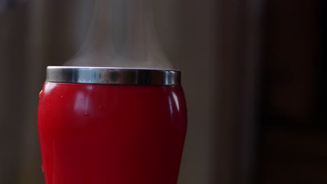 steam rising from a red mug