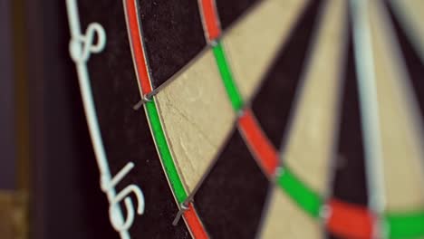 a darts player checks out on double 16