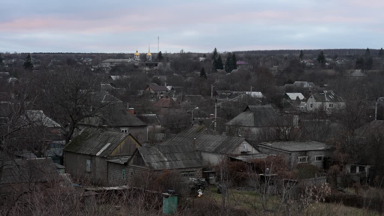 The sun sets on a village near the frontline in the Donbas region of Ukraine. A somber and quiet end to another day in the ongoing war against Russia