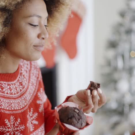 young woman enjoying a christmas treat