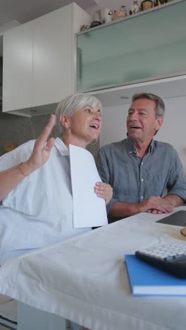 older couple meeting at home