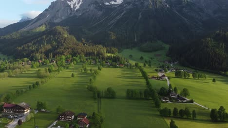 4k drone shot of beautiful misty sunrise at ramsau am dachstein, styria, austria