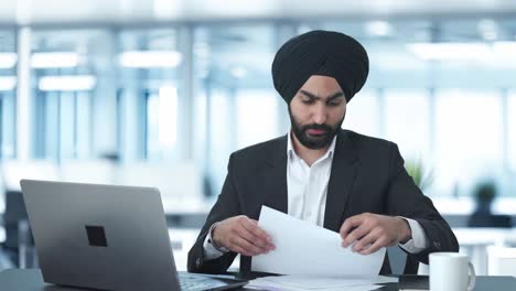 happy sikh indian businessman doing meeting on video call