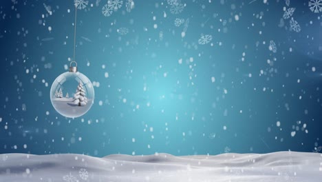 Christmas-tree-in-a-hanging-bauble-decoration-and-snowflakes-falling-over-winter-landscape