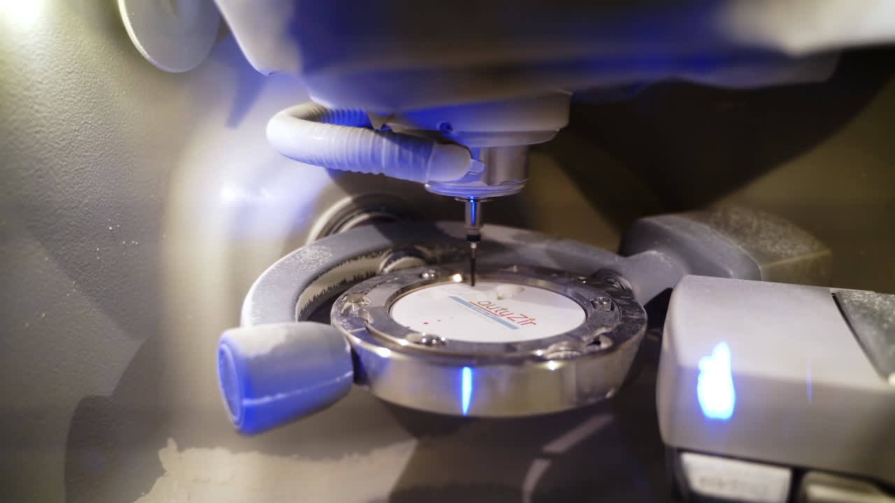 Machine in the dental clinic. The process of modeling prostheses using automated machine