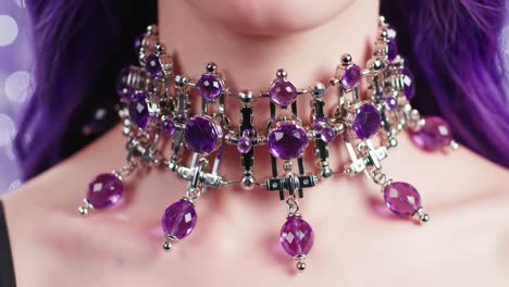 a stunning collection of elegant choker necklaces featuring exquisite purple gems and metallic accents, perfect for adding glamour to any fashion ensemble