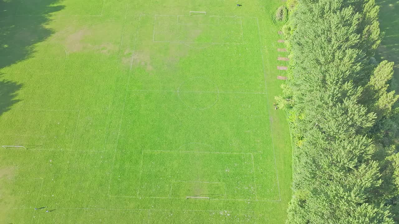 Aerial View, Green Grassy Soccer Football Field In Park, Top Down View