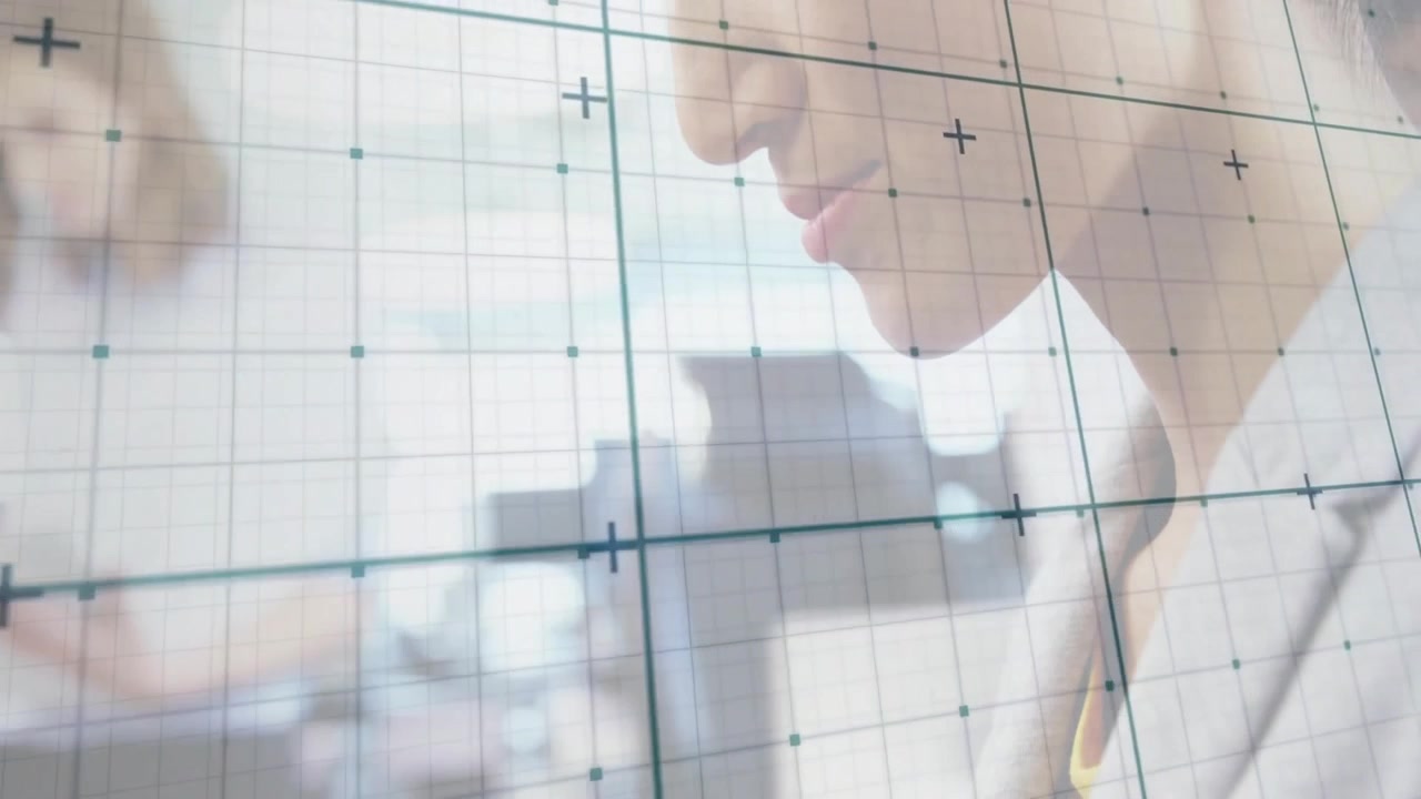 Businesswoman tapping stylus on tablet typing keyboard as transparent overlay framing data review