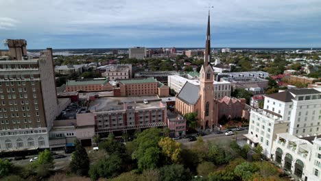 aerial-of-st-matthews-lutheran-church-and-the-francis-marion-hotel-in-charleston-sc,-south-carolina