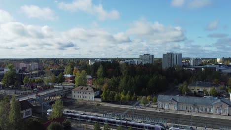 Aerial-flyover-Kerava-Railway-Station-in-boreal-forest-city-of-Finland