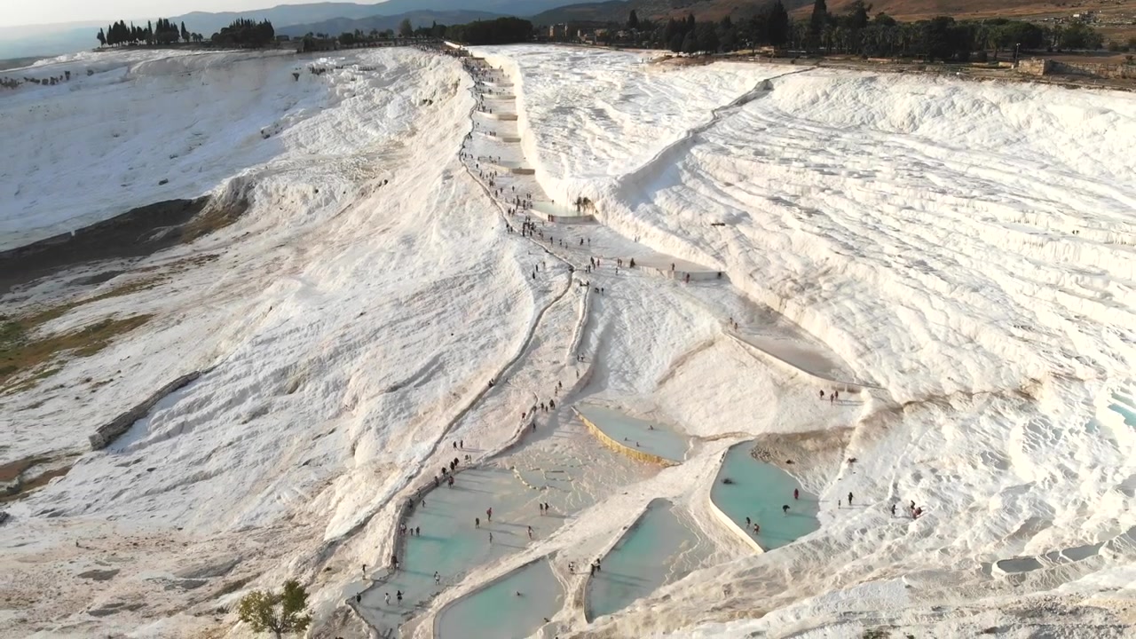 Aerial View of Tourists Walking on Pamukkale Travertine Terraces