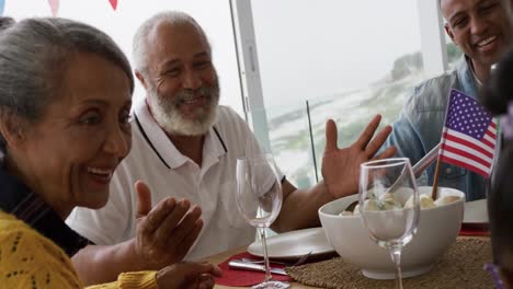 multi-generation family having celebration meal