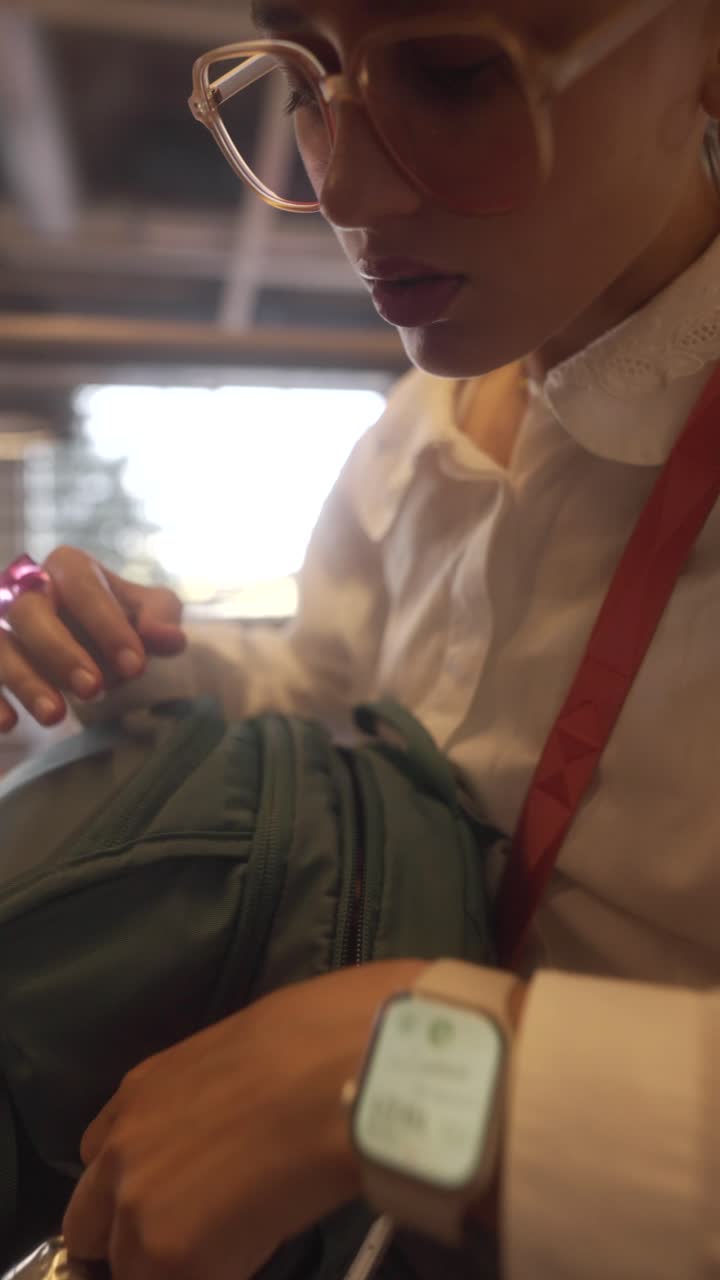 Woman checking her backpack