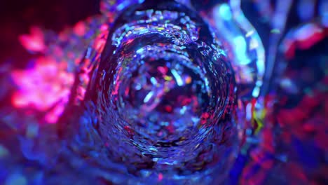 embudo de agua giratorio en iluminación de neón. túnel de agua redondo. color azul. animación 3d de un bucle sin costuras.
