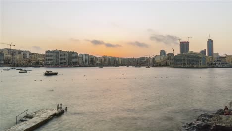 blue hour at resort town of sliema on mediterranean island malta, time-lapse